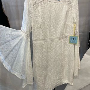 White eyelet bell sleeve dress